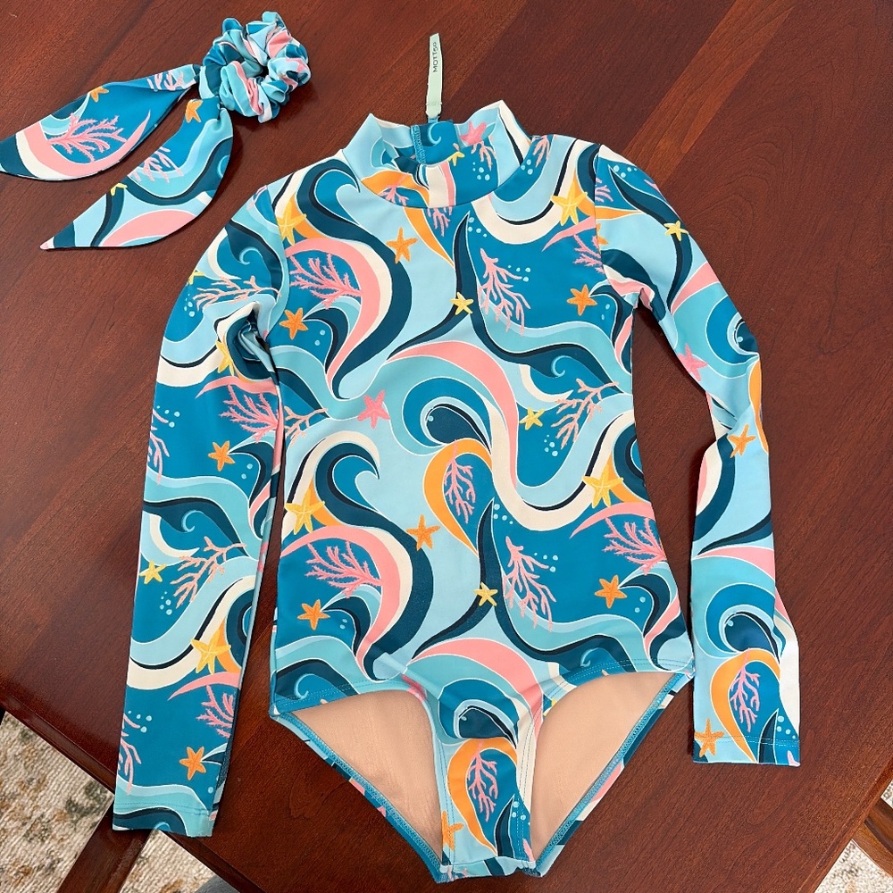 Mott50 swimsuit with matching hair bow